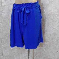 PANTALON LISO CORTO CON BOLSILLOS Y LAZADA
